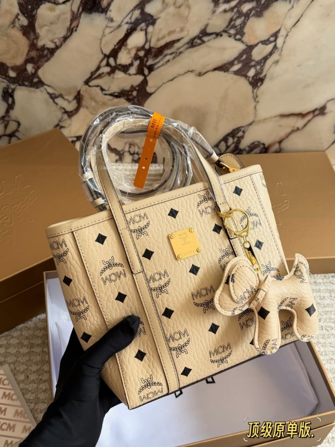 MCM bag Original top quality Qingdao OEM gift puppy pendant all steel hardware — 1:1 Replica For Sale — photo 7