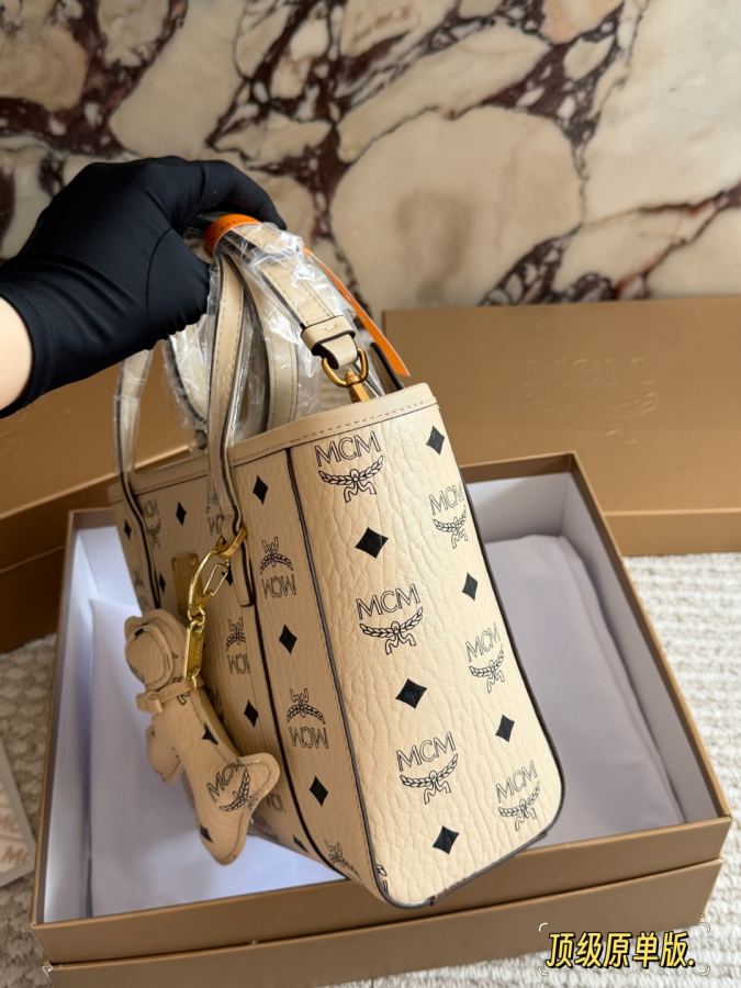 MCM bag Original top quality Qingdao OEM gift puppy pendant all steel hardware — 1:1 Replica For Sale — photo 4