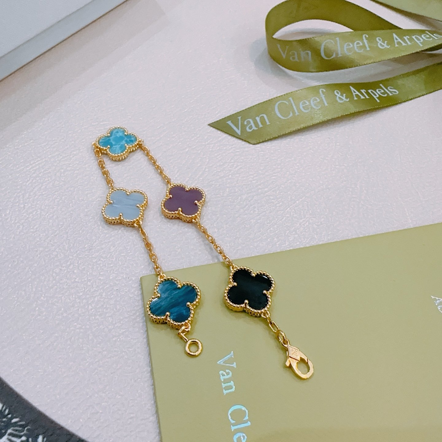 Van Cleef Arpels Alhambra bracelet Yellow gold with multicolor clover inlays sky blue pale blue-gray deep teal blue purple black 19cm