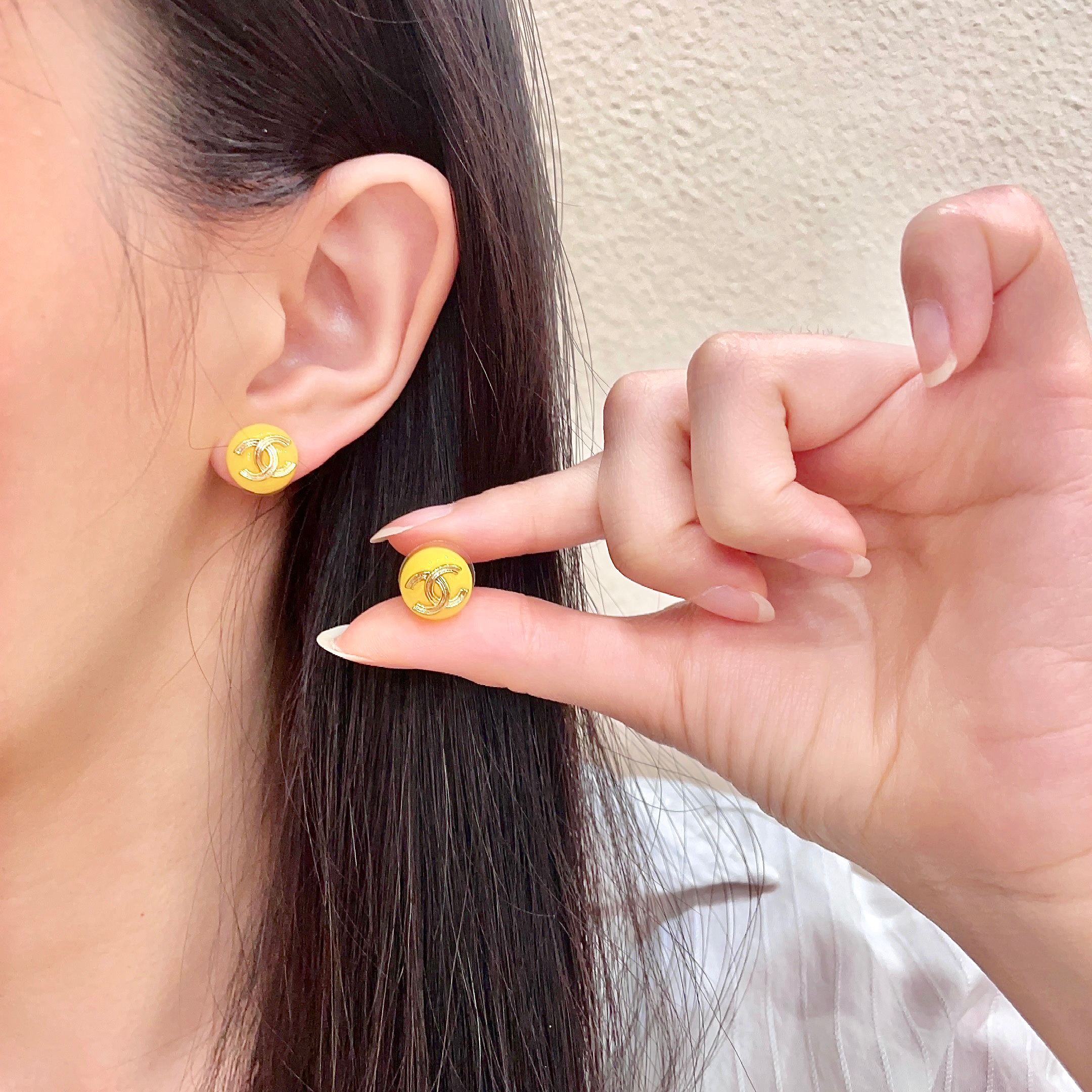 Chanel CC Logo Round Stud Earrings earrings gold-tone metal bright yellow resin 10mm diameter