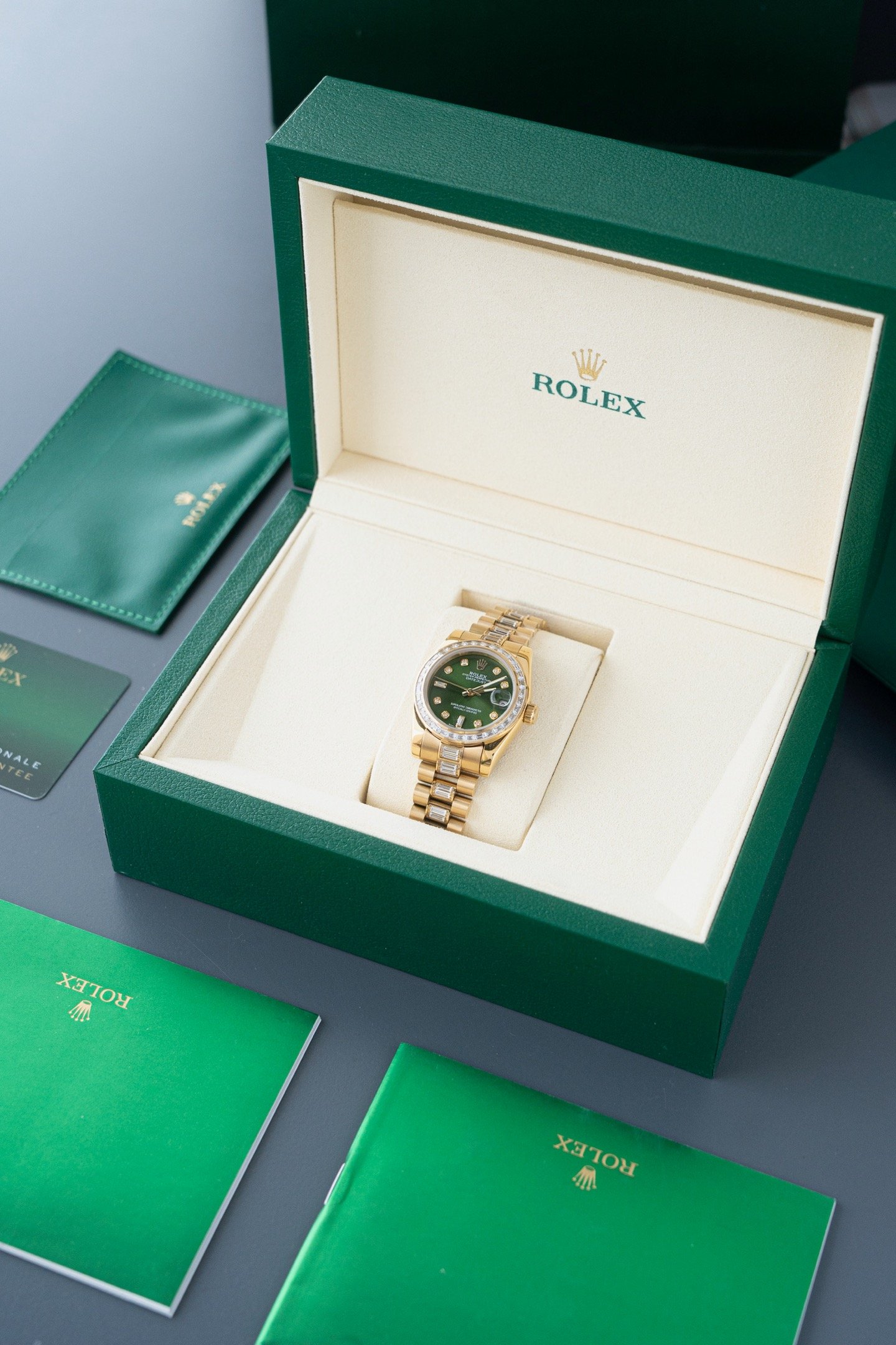 Rolex Watches The bezel is set with square diamonds The strap is set with square diamonds]