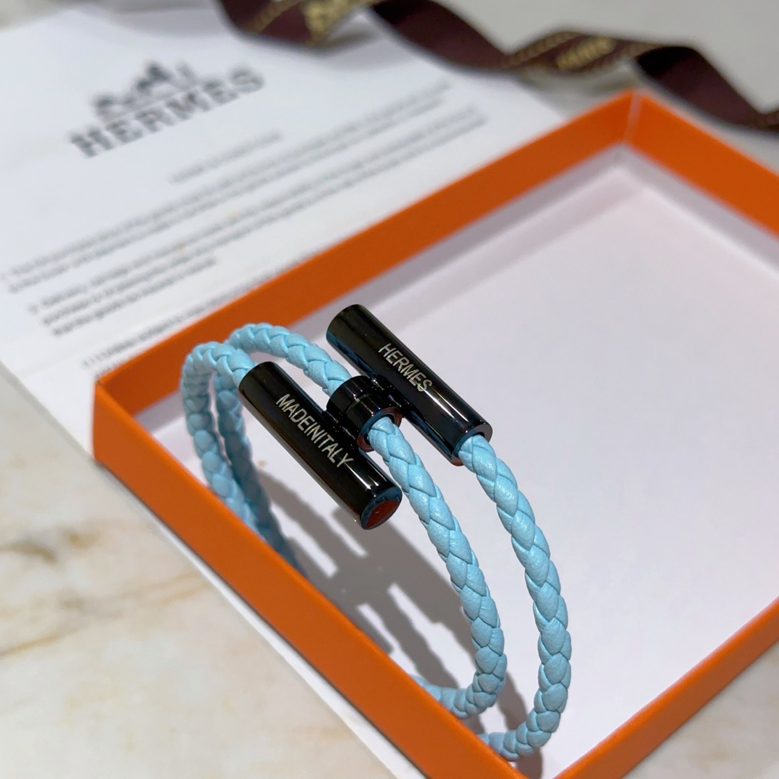 Hermes Tournis Tresse bracelet light blue braided leather gunmetal black hardware 19cm