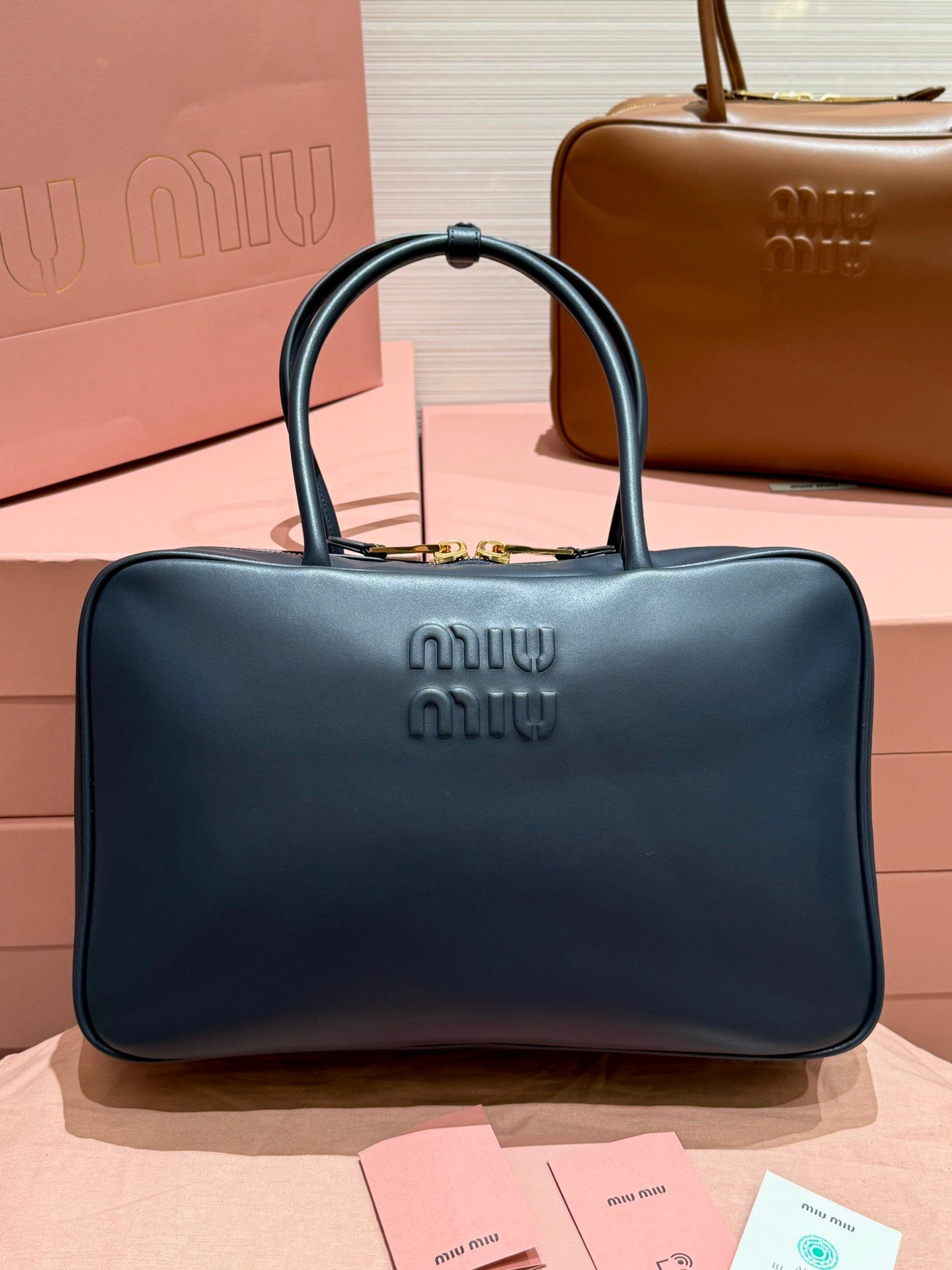 MiuMi*long wrist bowling ball/briefcase