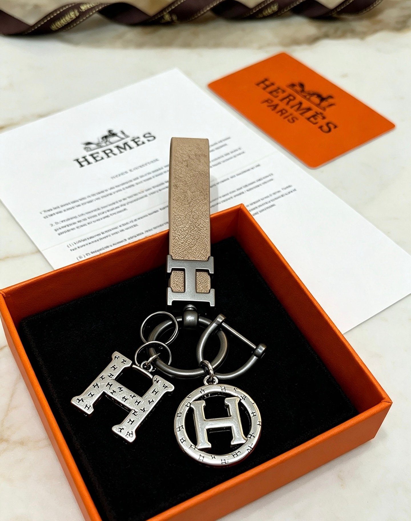 Hermes H Logo Charm Keychain pendant Etoupe taupe leather gunmetal silver-tone metal 10cm total length