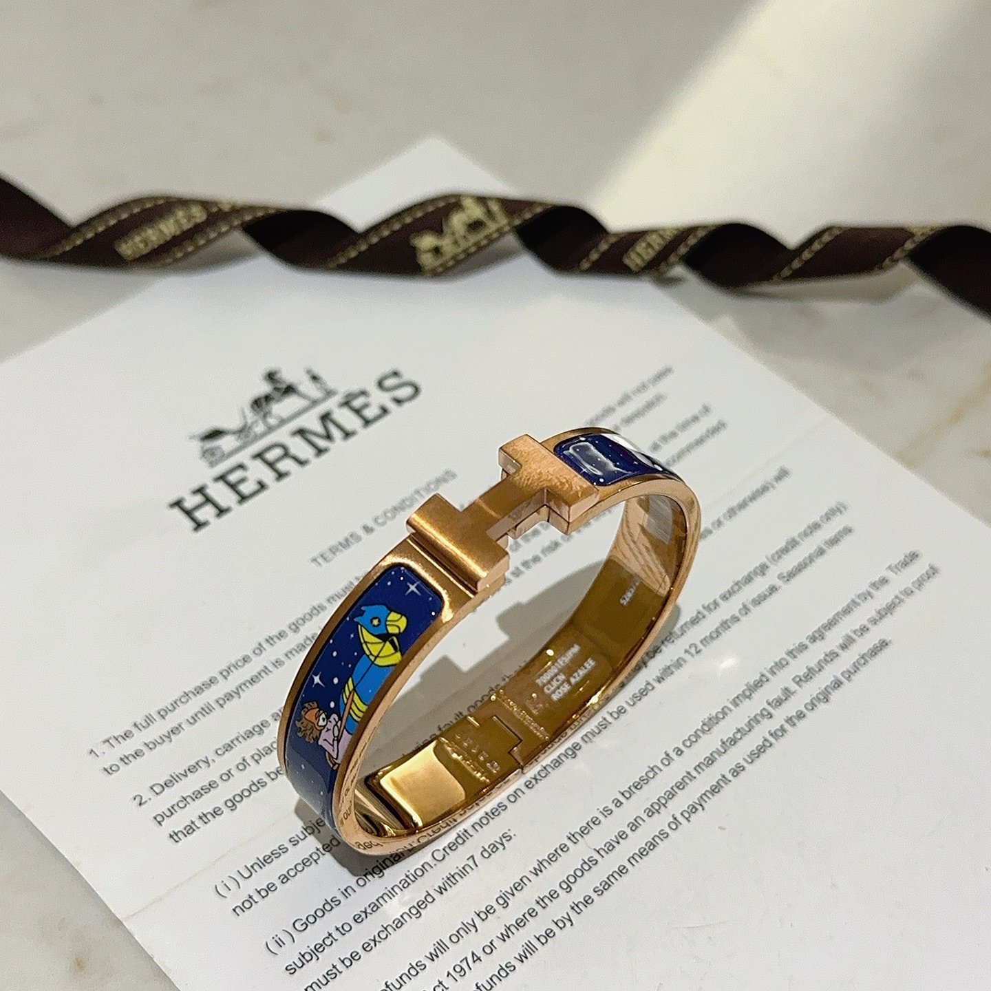 Hermes Clic H Space Fantasy Enamel Bangle bracelet Rose gold metal with navy blue enamel featuring multicolor space and character prints 17