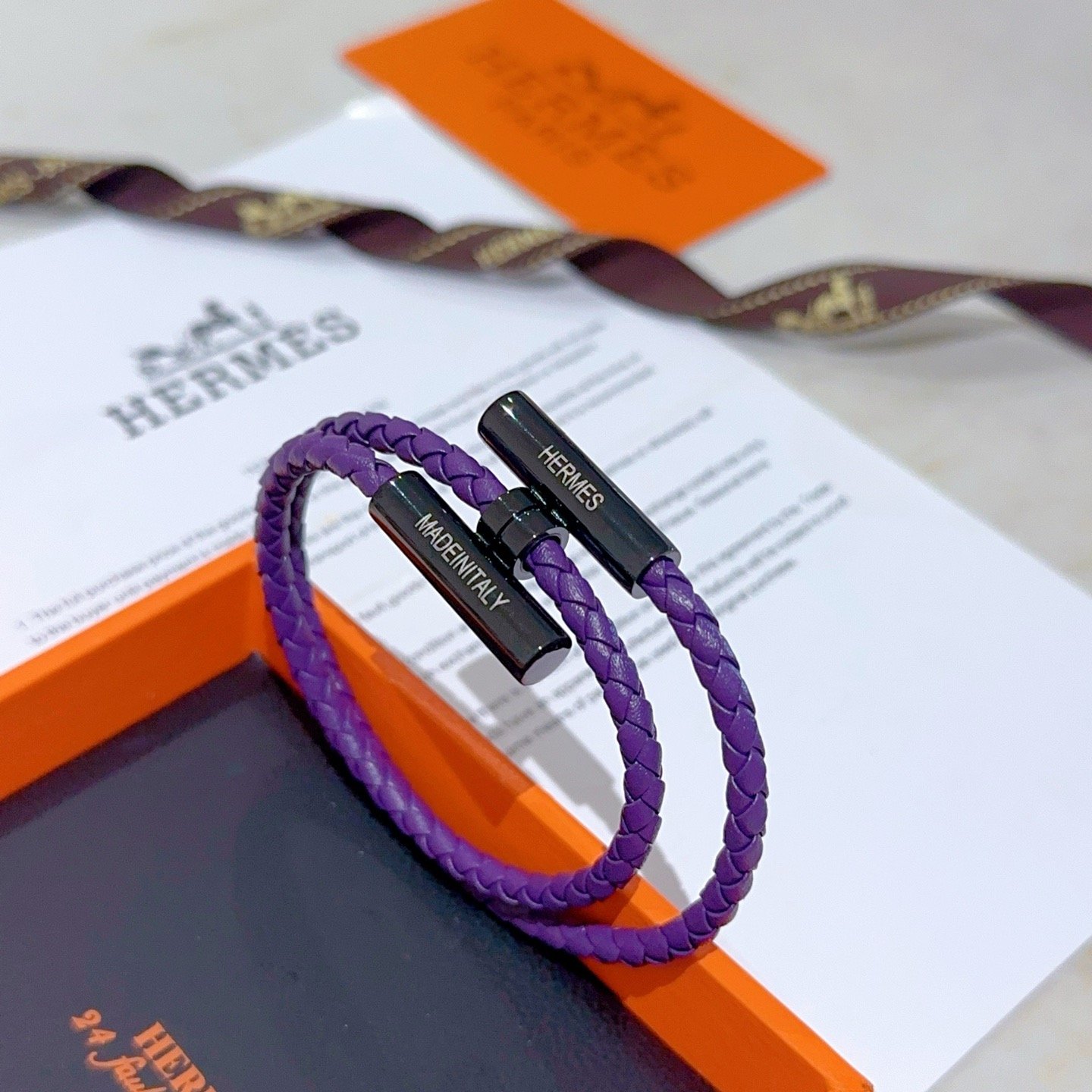 Pulseira Hermes Tournis Tresse Couro trançado roxo com ferragens de metal preto 19 cm
