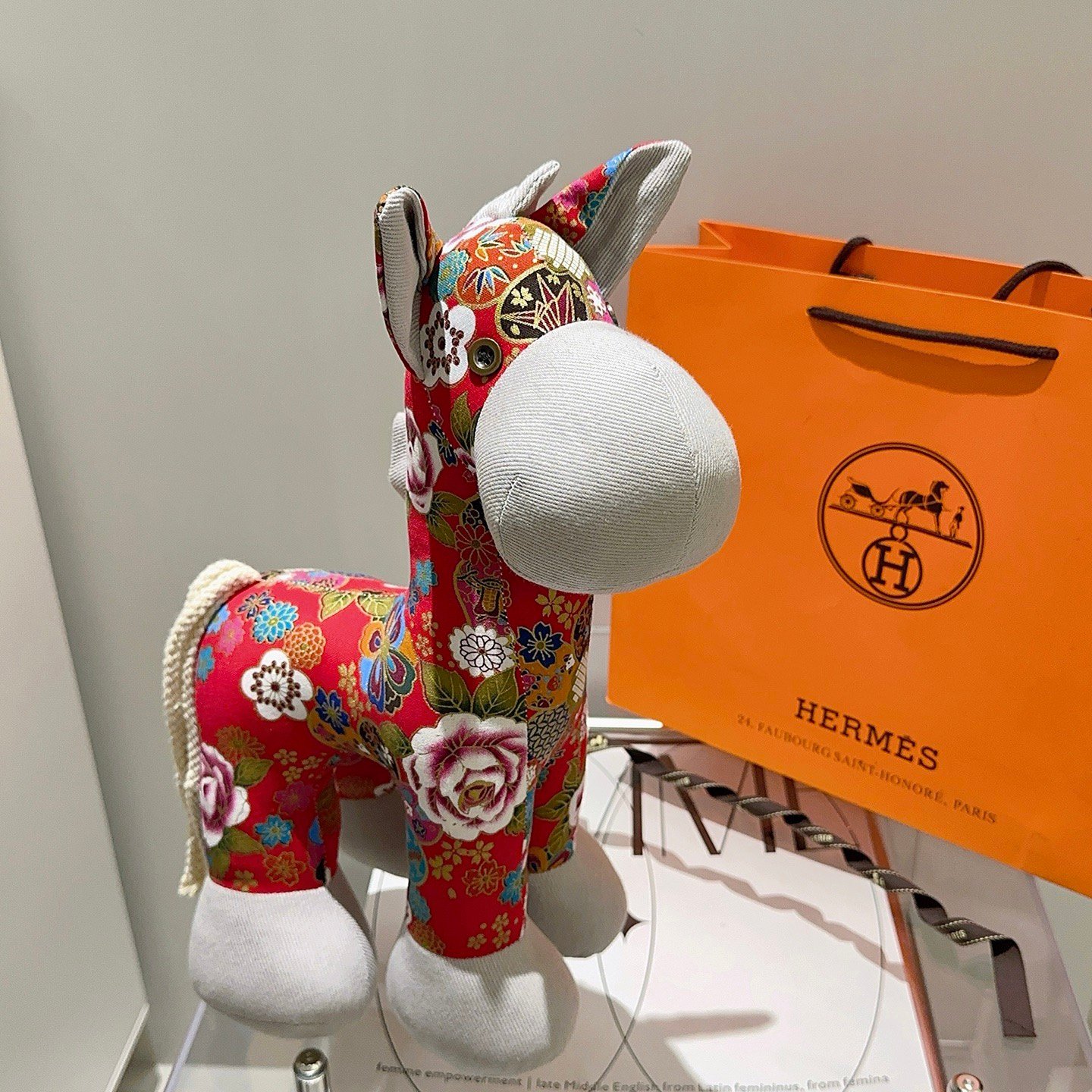 Hermes Hermes Horse Plush brooch Red floral printed fabric with light gray fabric accents off-white cord tail metal button eye detail 35cm