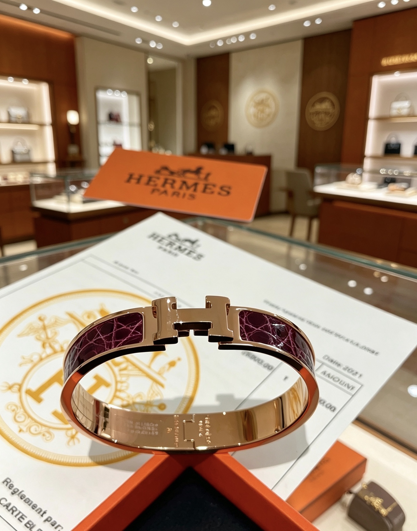 Hermes Clic H bracelet rose gold metal burgundy crocodile embossed enamel PM