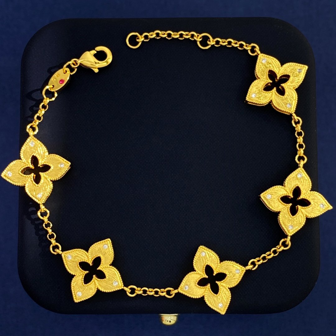 Van Cleef Arpels Venetian Flower bracelet Yellow gold with clear diamond accents and red enamel detail 18cm