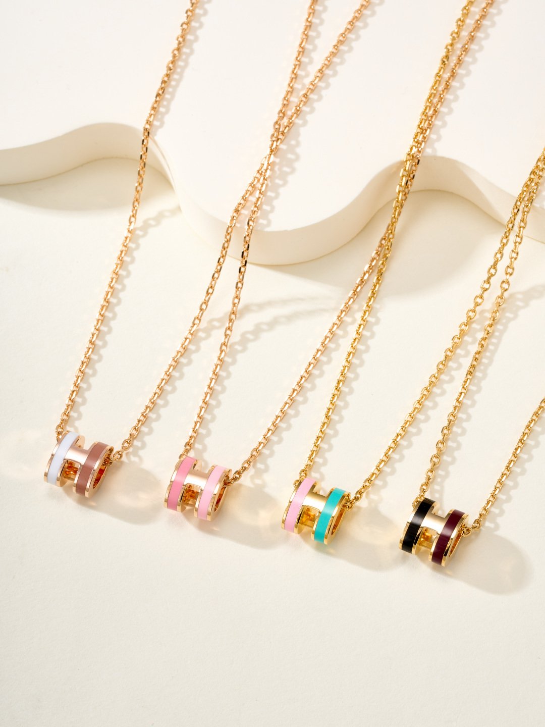 Hermes Mini Pop H Rocabar necklace rose gold metal with white and brown enamel 40cm