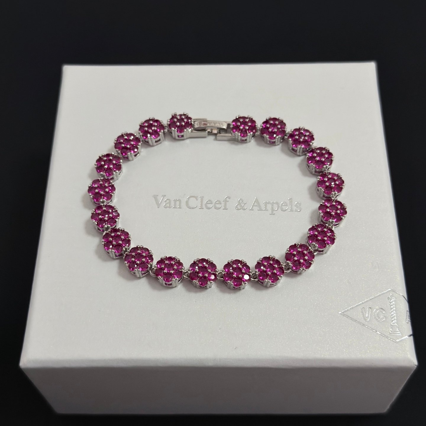 Van Cleef Arpels Four-Leaf Clover bracelet silver-toned metal with fuchsia pink gemstones 18cm