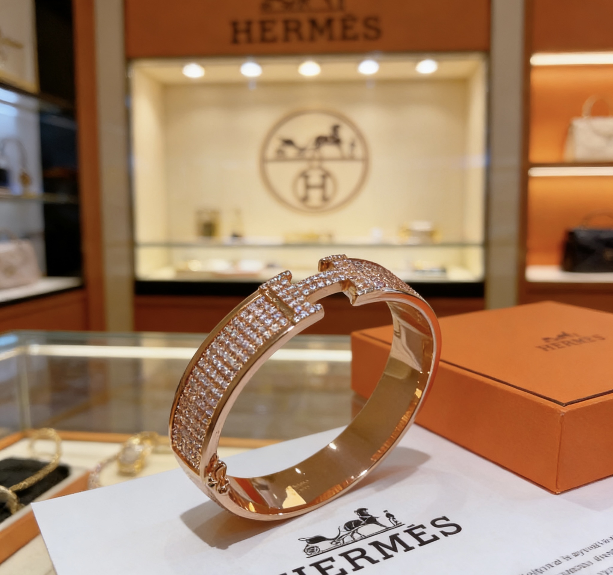 Hermes Clic Clac H Full Pave bracelet Rose gold metal with full pave clear diamond-like stones 17cm inner circumference